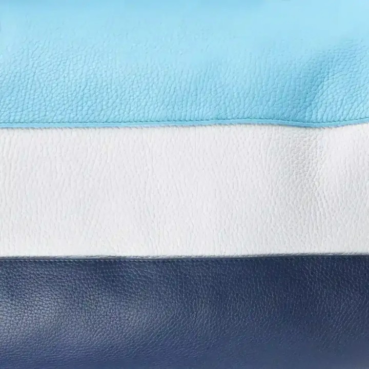 Toiletry bag in grained leather light blue/white/navy blue